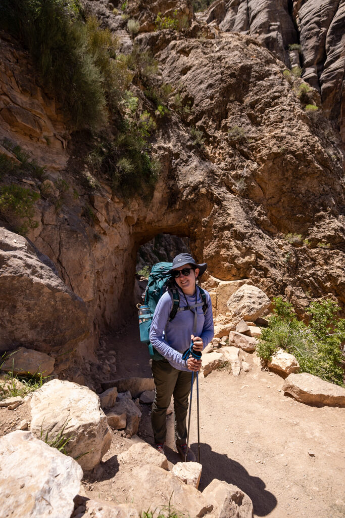 Jen standing by the first arch you'll pass under on the Bright Angel Trail