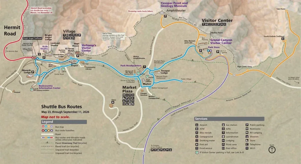 Grand Canyon South Rim shuttle bus routes map showing red Hermit Road route, orange Desert View Drive route, and blue Village Route with stops, parking, lodging, and services marked for May 23 through September 11, 2026