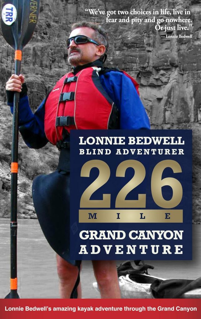Book cover for "226: How I Became the First Blind Person to Kayak the Grand Canyon" by Lonnie Bedwell and Joel Canfeld, featuring Lonnie in kayaking gear holding a paddle against a canyon rock wall, with his inspirational quote about choosing to live