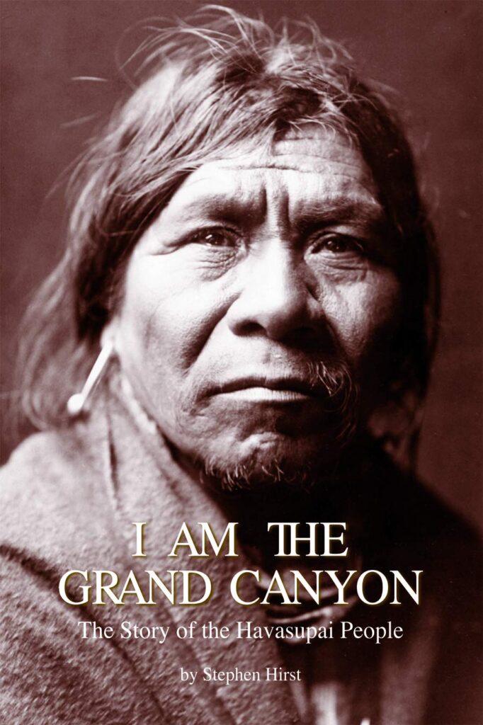 Book cover for "I Am the Grand Canyon: The Story of the Havasupai People" by Stephen Hirst, featuring a sepia-toned portrait of a Havasupai man