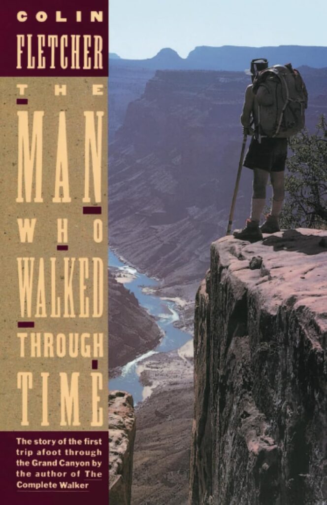 Book cover of "The Man Who Walked Through Time" by Colin Fletcher, showing a hiker with backpack standing on a rocky outcrop overlooking the Grand Canyon and Colorado River below