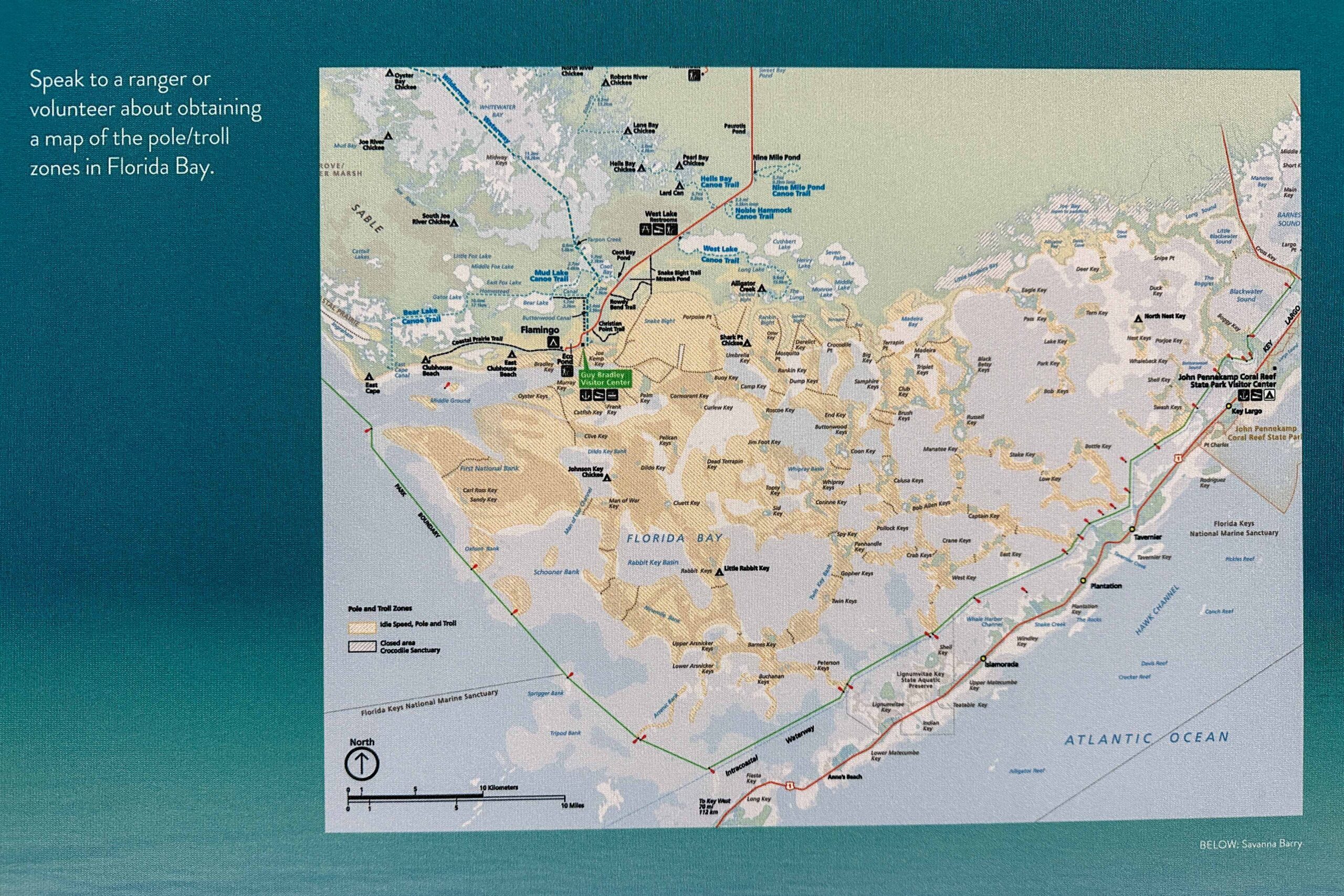 Map of Everglades National Park showing waterways, trails, camping areas, and visitor centers across Royal Palm, Flamingo, Shark Valley, and Gulf Coast regions