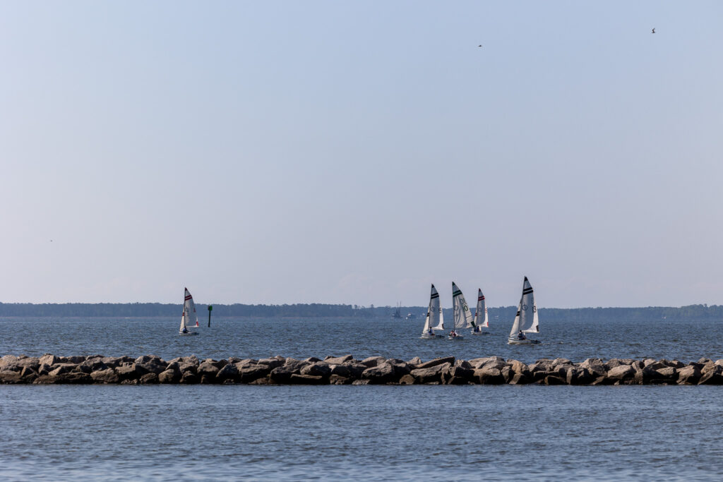 collegiate sailors with breakwall in view oriental nc