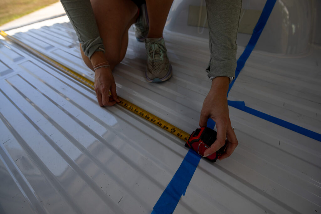 jen measuring the bed